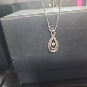 Fluttering Heart Diamond In Tear Drop Pendant